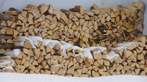 Stack of wood in snow Stock Footage 59305276