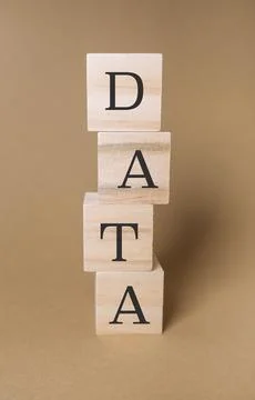 Stack of wooden blocks with the letters DATA on top 写真素材