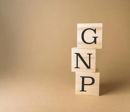 Stack of wooden blocks with the letters G, N, and P on top Stock Photos
