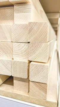 A stack of wooden blocks with a red background. The blocks are all different Stock Photos