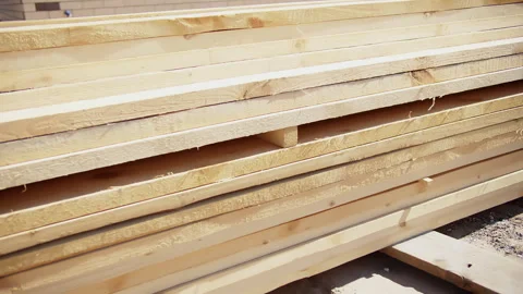 Stack of wooden boards at building site Stock Footage 310044108