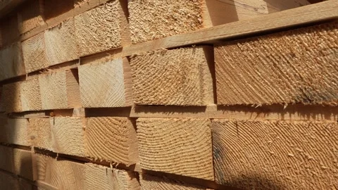 Stack of Wooden boards lumber beams, industrial wood pine timber at warehouse 스톡 동영상 243837003
