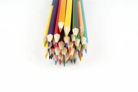 Stack of wooden colored crayons on white background Stock Photos