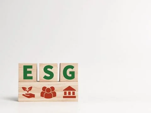 Stack of wooden cubes featuring the acronym ESG, environment, society and govern 스톡 사진