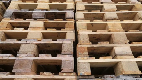 Stack of wooden Euro Pallets in a warehouse used for easy loading and unloading Stock Footage 167513653