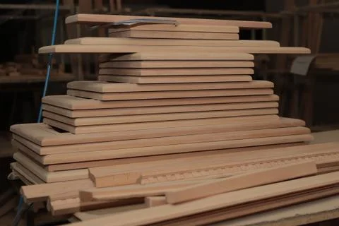 A stack of wooden facades is waiting for processing Stock Photos