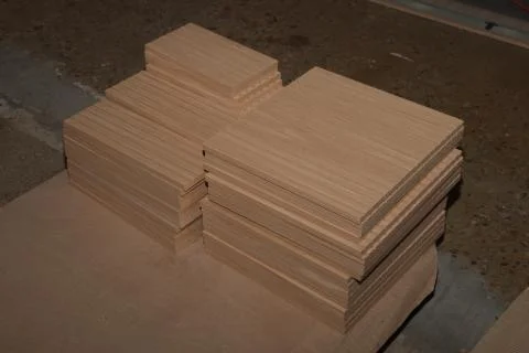 A stack of wooden facades is waiting for processing Stock Photos