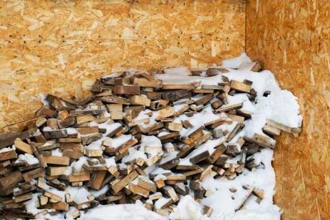 A stack of wooden firewood. Stock Photos