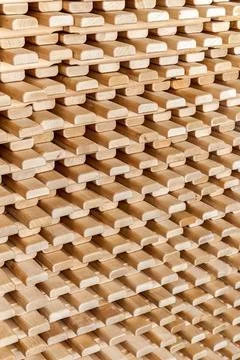 Stack of wooden lattices of natural solid birch as background 库存照片