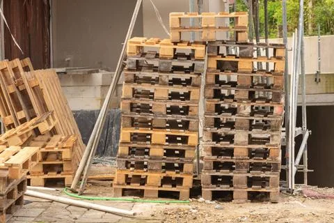 Stack of wooden pallets at a construction site stack of wooden pallets at ... Stock Photos
