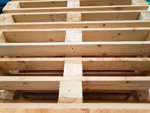 A stack of wooden pallets in an industry environment Stock Photos