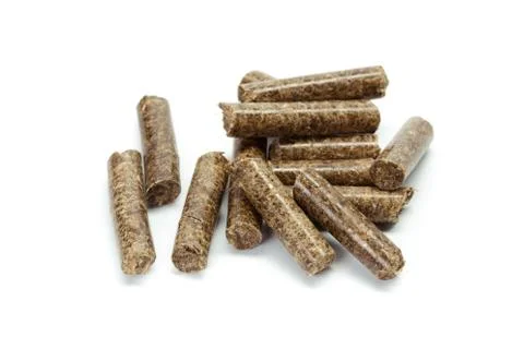 Stack of wooden pellets for bio energy, white background, isolated Stock Photos
