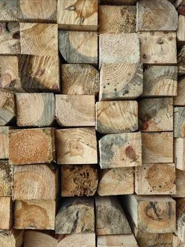 Stack of Wooden Planks in Construction Warehouse for Building Projects Stock Photos