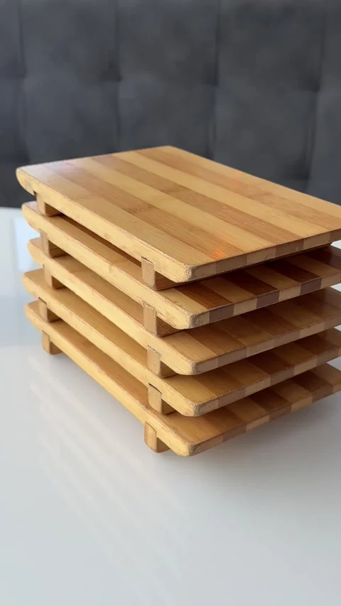 Stack of wooden serving boards for sushi food presentation and kitchen use on Stock Footage 346183511