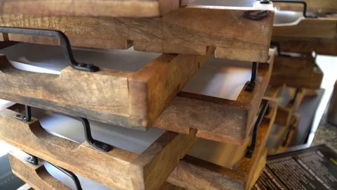 A stack of wooden trays in a restaurant Stock Footage 118805080