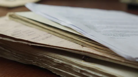 Stack of Worn Documents Dropped, Archival Evidence and Historical Records Scene Stock Footage 334718257