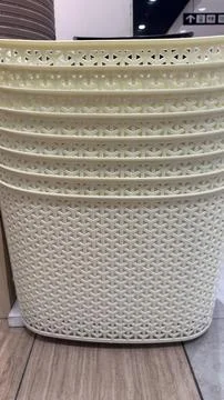 Stack of Woven Beige Baskets for Storage and Organization in Home. Stock-Fotos