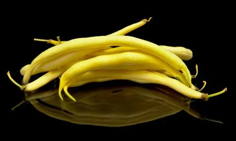 Stack of yellow beans on black background,healthy food Stock Photos