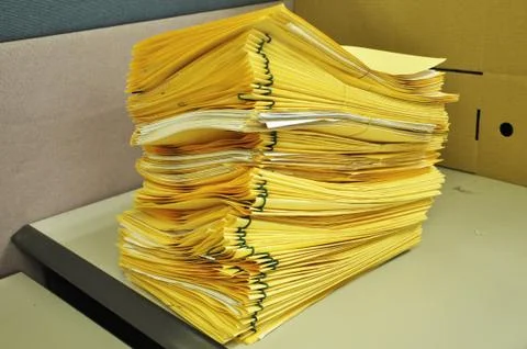 Stack Of Yellow Folders On The Table Foto stock