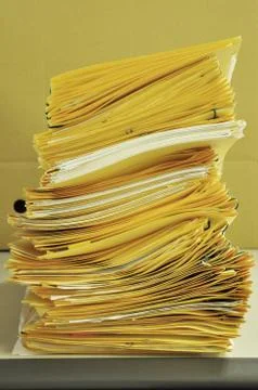 Stack Of Yellow Folders On The Table Foto stock