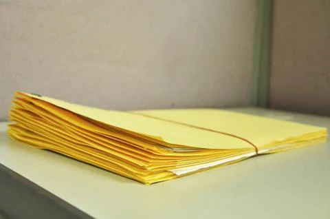 Stack Of Yellow Folders On The Table Foto stock