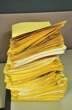 Stack Of Yellow Folders On The Table Foto stock