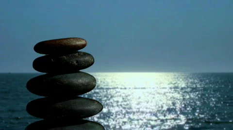 Stack of Zen rocks against ocean V1 - HD Video stock 569713