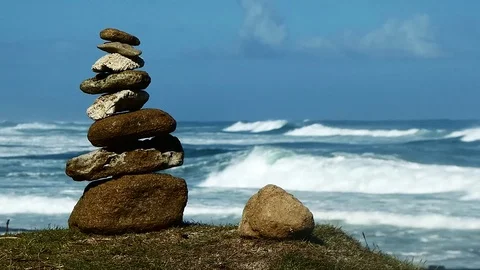Stack of Zen Rocks on The Beach Stock Footage 129129554