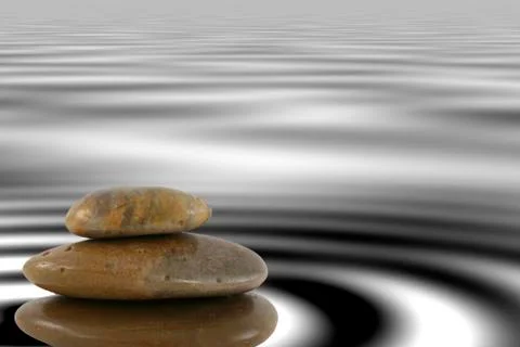 Stack of zen rocks on water Stock Photos