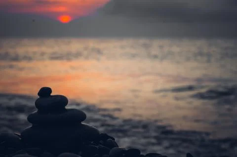 Stack of zen stones on pebble beach Stock Photos