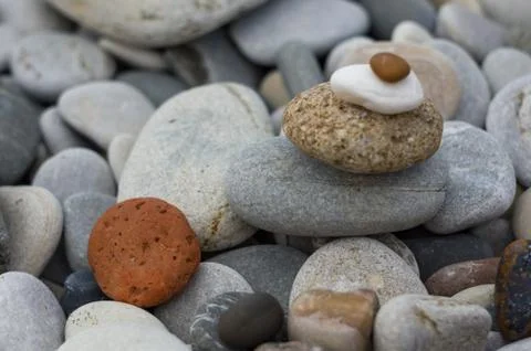 Stack of zen stones on pebble beach Stock Photos