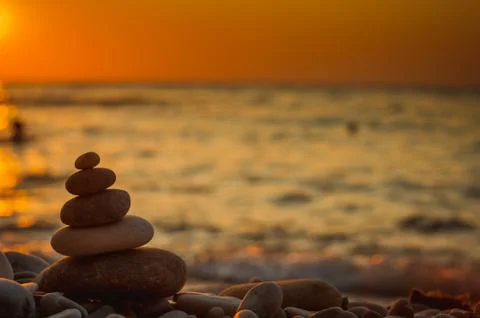 Stack of zen stones on pebble beach Stock Photos