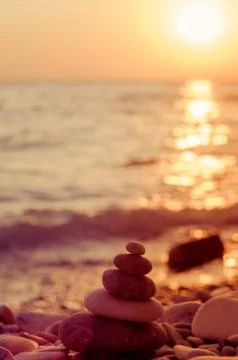 Stack of zen stones on pebble beach Stock Photos