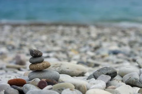 Stack of zen stones on pebble beach Stock Photos
