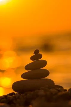 Stack of zen stones on pebble beach Stock Photos