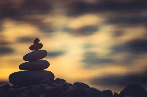 Stack of zen stones on pebble beach Stock Photos