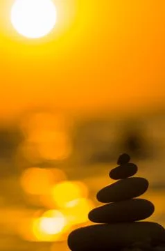 Stack of zen stones on pebble beach Stock Photos
