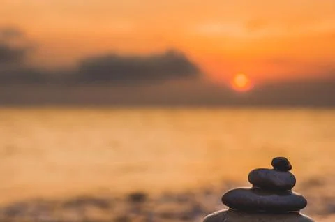 Stack of zen stones on pebble beach Stock Photos