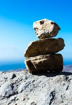 Stack of zen stones.balancing on a sky background Stock Photos