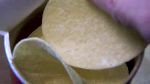 Stackable Potato Crisps Rotating Inside an Open Snack Container Stock Footage 345426766