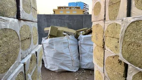 Stacked Bales in a Storage Facility for Efficient Management and Distributi.. Stock Photos