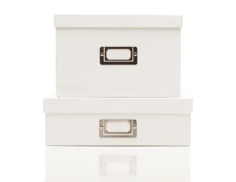 Stacked Blank White File Boxes with Lids on White Stockfoto's