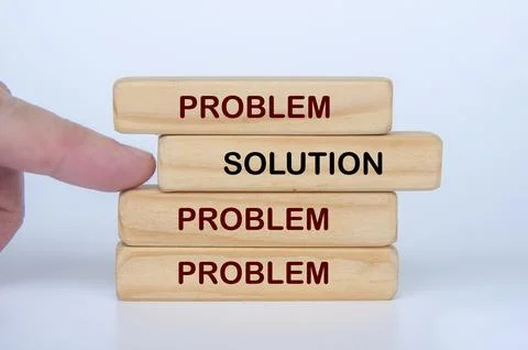 Stacked blocks showing solution overcoming multiple problems and challenges. Stock Photos