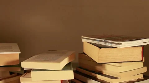 Stacked books (tracking motion) Stock Footage 8667398