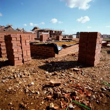 Stacked bricks on construction site Stock Photos