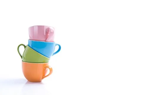Stacked ceramic cup with copy space on isolated white Foto stock