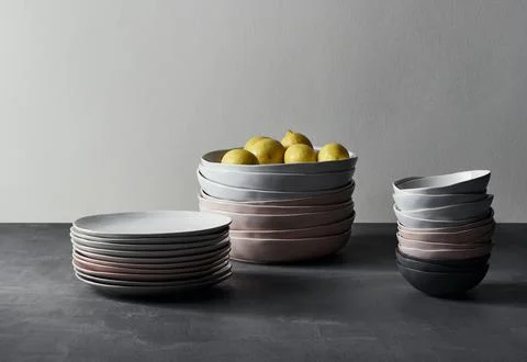Stacked Ceramic Tableware with Lemons Stock Photos
