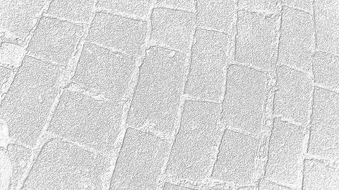 Stacked in a certain order, squared stones of a rectangular shape. Cobbleston Stock Photos