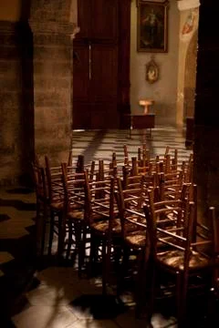 Stacked chairs in Como Cathedral, Como, Lombardy, Italy, Europe - August 2011 Stock Photos