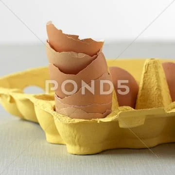 Stacked Chicken Eggs In An Egg Box